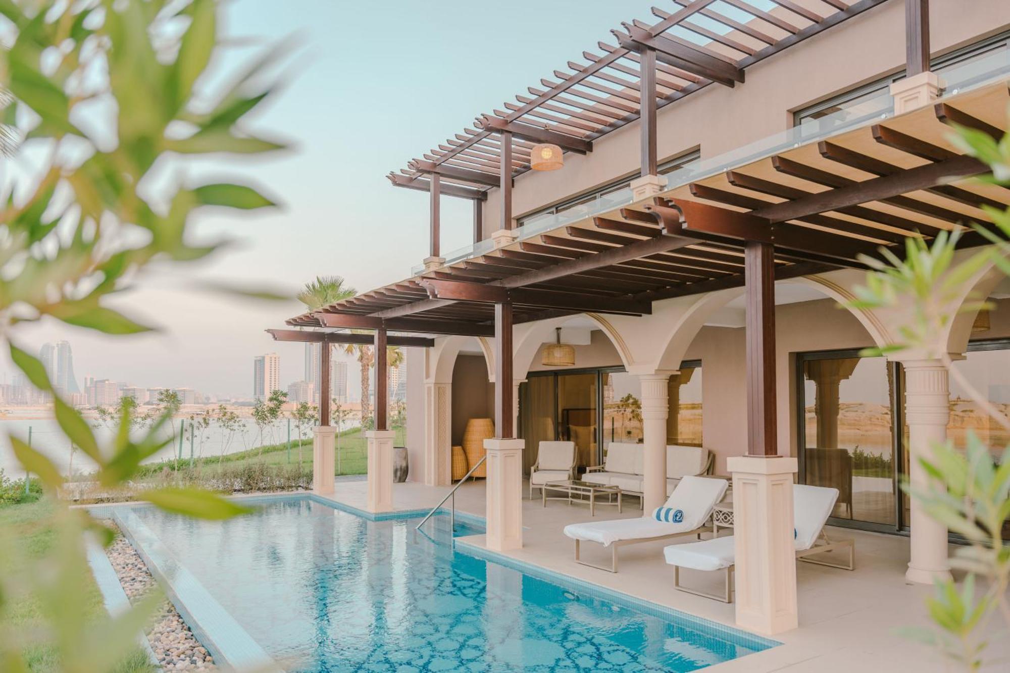 Royal Saray Resort Manama Exterior photo A pool villa at the hotel